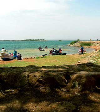 Visitors on the shore of Haleji Lake